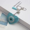 Fashionable heart evil eye keychain with light blue rhinestone and stylish tassel - Lake Blue
