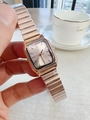 Detail of rose gold square watch with metal chain strap and elegant brand logo dial - White Dial / Rose Gold