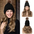 Black knitted beanie with golden blonde long wavy synthetic hair and brown fur pompom - 12H26 Light Golden Mixed