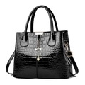 Glossy black crocodile pattern handbag featuring a unique cat shaped metal charm - Black