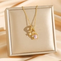 Collier élégant en acier titane doré avec breloque étoile et zircon carré rose - Or Gland Étoile (8737)