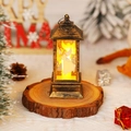 Close-up of vintage bronze Christmas lantern with angel silhouette and warm light - Brushed Gold Angel
