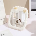 Creamy white wavy desktop makeup mirror with cute lamb and flower accents in variant view - Cute Sheep / Cream