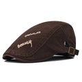 Detail of brown cotton flat cap with TROMAS embroidery and adjustable metal buckle - Adjustable / Coffee