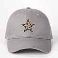 Detail of grey cotton baseball cap featuring a leopard print star and breathable eyelets - Gray