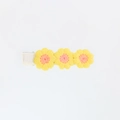 Detail of three yellow and orange embroidered crochet flowers on a fabric-covered hair clip - Yellow and Orange