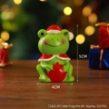Mini resin Christmas frog figurine with red hat and cape, 5cm high holiday desktop decor - Frog