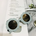 Light blue flower-shaped kids sunglasses with UV400 protection and matte finish - Matte Gray Blue