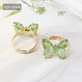 Elegant light green butterfly ring with gold adjustable band and crystal wings - Light Green