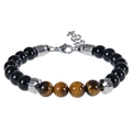 Vue macro détaillée des perles oeil de tigre 8mm et obsidienne sur bracelet ajustable - Bracelet Oeil de Tigre
