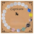 Detail of Capricorn zodiac bracelet with blue sand stone beads and golden star charm - Capricorn-Style 3