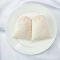 Elegant cream white satin drawstring jewelry pouches with smooth silk texture - Beige
