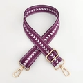 Detailed view of purple nylon strap with white arrow pattern and gold metal hardware - Purple Silver