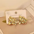 Goldene Schmetterling-Ohrstecker aus Edelstahl im polierten geometrischen Punk-Stil - Gold Schmetterlingsstruktur (34)