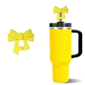 Yellow silicone bow straw cover accessory for Stanley cups displayed on white background - Yellow
