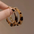 Close-up of retro leopard print resin hoop earrings with elegant gold inner metal lining - Wide Amber Tortoise Hoop / Gold Coffee (10# Silver Needle)