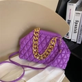 Purple quilted shell bag with chunky gold chain strap and elegant cross-body design - Purple