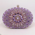 Close-up of luxury purple rhinestone clutch bag with central crystal floral design - Light Purple