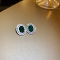 Macro shot of emerald green oval stud earrings with sparkling zircon halo on silver base - 76# Silver Pin - Silver Color - Green