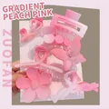Lot de pinces à cheveux rose pêche dégradé avec motifs de fleurs et papillons mats - Rose Dégradé Lot de 8
