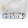 Macro view of modular stainless steel charm bracelet with light blue heart crystals - Heart Light Purple Gem (18 Links)