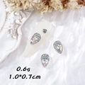 Teardrop aurora nail rhinestone with white accent stones for elegant DIY nail art design - Water Drop