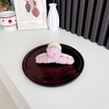 Pink and white plush shark hair claw clip in a minimalist two-tone fuzzy design - Apricot + Lotus Pink