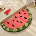 Semi-circular watermelon plush bathroom mat with vibrant red pulp and green rind design - Bite of Watermelon