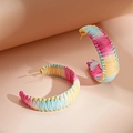 Colorful woven C-shaped hoop earrings with vibrant mixed fibers and gold needles - Pink