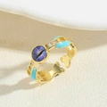 Detail of vintage gold ring with blue enamel and purple cat eye stone in macro view - Blue Enameled (JZ0388-5)