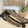 Elegant leopard print satin silk scarf with black border on a minimalist beige background - Leopard Print