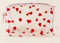 Transparent PVC makeup bag with cute red heart print and secure zipper closure - Red Heart