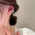 Detail of silver multi-layered ear cuff featuring a delicate small heart pendant - 14# Quilted Heart Pendant Style (Silver)