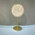 Beige velvet circular jewelry display stand with gold beads and heart pendant necklace - Double-Sided Round Screen Stand