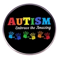 Round Autism Awareness metal badge with rainbow text and colorful handprints on black - Style 6 (Embrace)