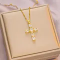 Gold titanium steel cross necklace with oval clear crystals on a champagne jewelry box - 6045 Cross White Zircon / Gold White Zircon