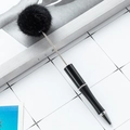 DIY black beaded pen featuring a soft fluffy plush pompom on a minimalist metal rod - Black