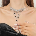 Elegant silver jewelry set featuring layered crystal necklace and black gemstone earrings - Black Ring Dangle Silver Set(DTN14026560BK)
