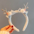 Christmas headband featuring silver glitter reindeer antlers and blue bows with stars - Silver Snow Glitter Headband