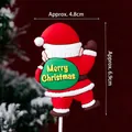 Cute Santa Claus cake topper with green gift bag and Merry Christmas text for cakes - Soft Rubber Santa with Green Backpack
