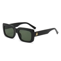 Chic black oversized square sunglasses with gold metal accents in a professional studio view - Black Frame with Dark Green Lenses