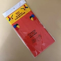 Detail of red heavy duty reusable plastic tablecover in 137x183cm retail packaging - 54x72 Inch / Red