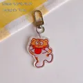 Cartoon tiger acrylic keychain variant with funny tongue expression and metal D-ring clasp - Naughty Tiger