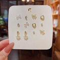Set de pendientes de plata S925 con circonitas de mariposa, corazón y perlas - Juego Multiforma de Corazón y Luna Holográficos (E5279金)