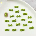 Schattige groene strikjes van hars voor nageldecoratie en DIY manicure-kunst - Groen