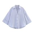 Detail of blue and white vertical striped shirt featuring a lapel collar and wood buttons - S / Blue Stripe