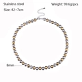Detail of 8mm silver and gold beaded stainless steel necklace with adjustable lobster clasp - 8mm / Gold and Silver