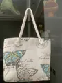 Off-white canvas tote bag featuring vintage blue butterfly print and thick rope handles - Butterfly Chart