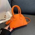 Mini bright orange lychee grain leather shell bag with silver hardware and shoulder strap - Orange