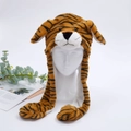 Detailed view of plush tiger hat with moving ears and soft orange striped fabric - Tiger